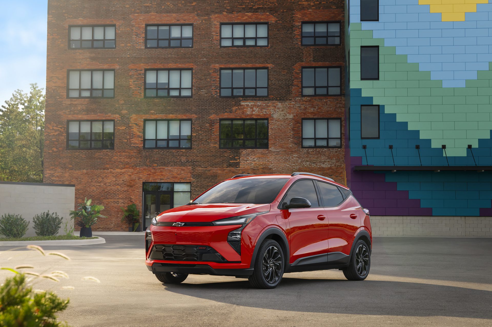 2027 Chevrolet Bolt RS in Red, front three-quarter view